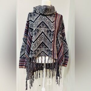 Free People boho sweater with fringe. Size small.